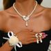 Women’s Jewelry Set Fashion Anti Pearl Necklace Earrings Bracelet Set Alloy Flower Bridal Dress Personality Suit Female Fashion Temperament_ipsvogv.com