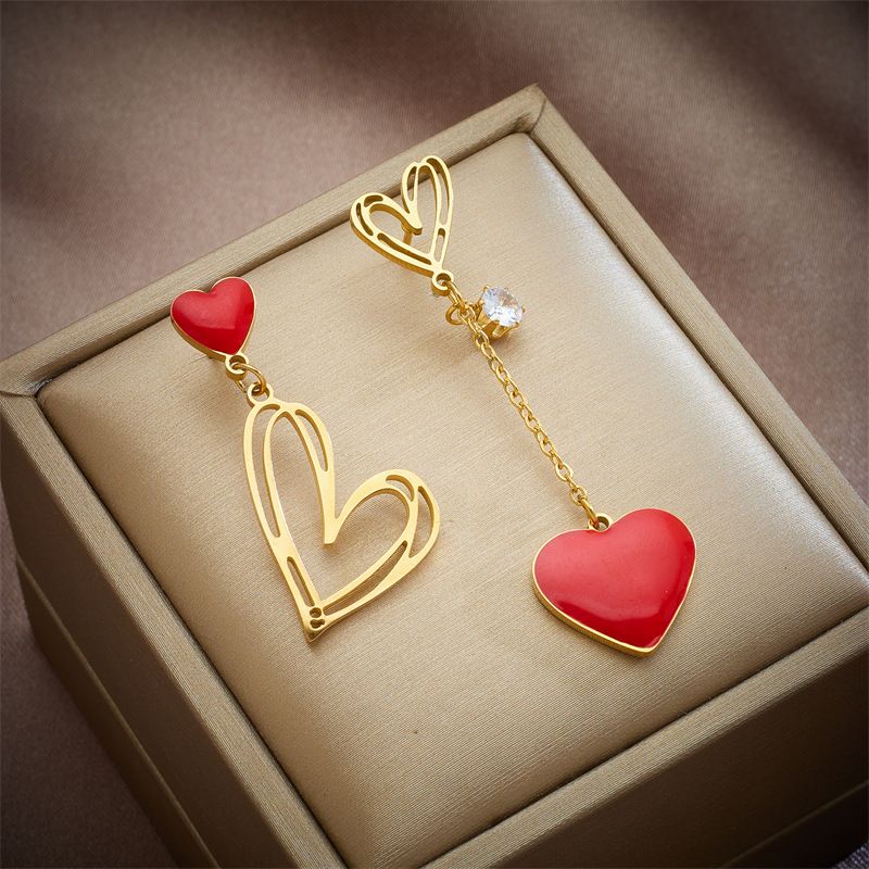 Unisex new creative personality niche asymmetrical hollow love titanium steel hanging earrings_ipsvogv.com