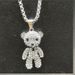Cute full diamond stainless steel titanium steel bear necklace sweater chain high end female versatile long niche design pendant_ipsvogv.com