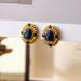 Vintage oval cat eye stone earrings with a high-end feel, niche luxury women's earrings, silver needles_ipsvogv.com