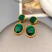 Exaggerated luxurious peacock stone a high-end and super flashy design, niche earrings with silver needles_ipsvogv.com