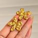 Fashionable Ins18k Gold Plated Titanium Steel Retro Lava Embossed Flower Earrings_ipsvogv.com