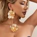 Fashion design three dimensional geometric flowers Retro irregular pleated metal necklace set for women_ipsvogv.com