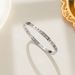 About Roman font titanium steel bracelet, Japan and South Korea creative jewelry, open hand ornament, electroplated real gold bracelet_ipsvogv.com