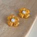 Fashionable Ins Plated Titanium Steel Retro Embossed Flower Pearl Earrings_ipsvogv.com