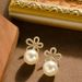 French Elegant Personalized Hollow Out Five Petal Flower Pearl Pendant For Women With A Sense Of Luxury And Temperament,_ipsvogv.com