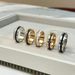 Baojia Shilong Rotating Ring, Gold Plated Gear Set With Diamonds, Running Black White Ceramic Wide And Narrow Ring_ipsvogv.com