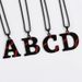 hot selling stainless steel 26 letter baseball oil drop necklace personality hip hop street style design jewelry_ipsvogv.com