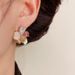 Spring New Fashion Sweet Versatile Diamond-Studded Pearl Five-Petal Flower For Women S Silver Needle Light Luxury_ipsvogv.com