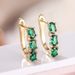 Cao Shi's Are Versatile Luxurious, Exuding A Sense Of Luxury And Sophistication. They Feature Oval Shaped Green Earrings_ipsvogv.com