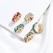 Unisex Creative New Personalized Earrings Fashion Popular Alloy Rhinestones No Ear Piercing Ear Clips_ipsvogv.com
