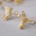 Cao Shi Fashion Youth Hollow Butterfly Earrings Electroplated Copper Inlaid Zircon Student Youth Girl Earrings_ipsvogv.com