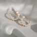 Retro Plated Titanium Steel Pearl Micro Inlaid Zircon Cute Earrings_ipsvogv.com