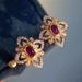 Cao Shi's Italian Four Leaf Grass for Women's Advanced Flower shaped Earrings in Palace Style_ipsvogv.com