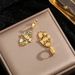 New All-in-one Titanium Steel Leopard Print Oil Drop Process Blue Eye Hollow Earrings For Women, Stainless Steel, Non_ipsvogv.com