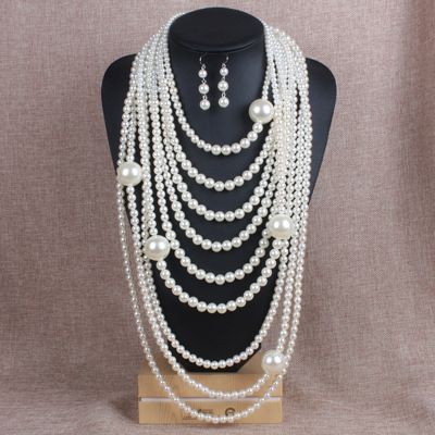 Fashionable and exaggerated multi-layer pearl necklace set with long sweater chain accessories 6050_ipsvogv.com