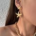 Fashionable Niche INS Titanium Vintage Large And Small Starfish Embossed Versatile Earrings_ipsvogv.com