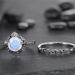Sanjie Women's Creative Black Warrior Jewelry Couple Pair Simple Moonstone Flower Ring_ipsvogv.com